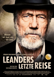 Filmplakat zu "Leanders letzte Reise". Das MGesicht eines älteren Mannes mit weißem Bart und einem schwarzen Hut.