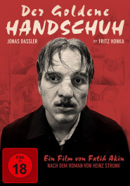 Filmplakat zu "Der goldene Handschuh". Vor rotem Hintergrund ein blasser junger Mann mit strähnigen Haaren.